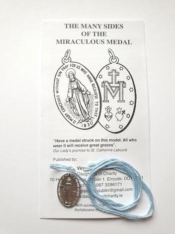 miraculous medal on blue string